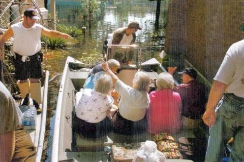 The Ursuline sisters of New Orleans are rescued by boat roughly a week after Hurricane Katrina hit in 2005. (Courtesy of The National Votive Shrine of Our Lady of Prompt Succor)