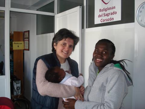 Sr. Fátima Santaló-Osorio with a migrant woman and her baby. (Courtesy of Fátima Santaló-Osorio)