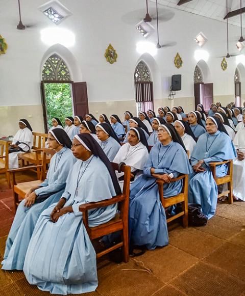 Franciscan Clarist Sisters attend a home mission orientation program in Sacred Heart Church in Peringulam, India. (Courtesy of Jossy Kallarangatt)