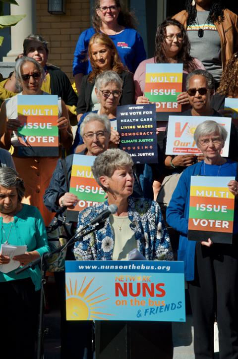 Sr. Sally Duffy speaks at the Nuns on the Bus stop at the Circle Resource Center Oct. 8 in Chicago. (GSR photo/Dan Stockman)