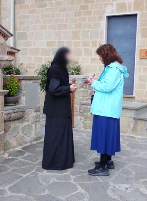 GSR Editor Emerita Gail DeGeorge interviews a sister from the monastery. (Courtesy of Gail DeGeorge)