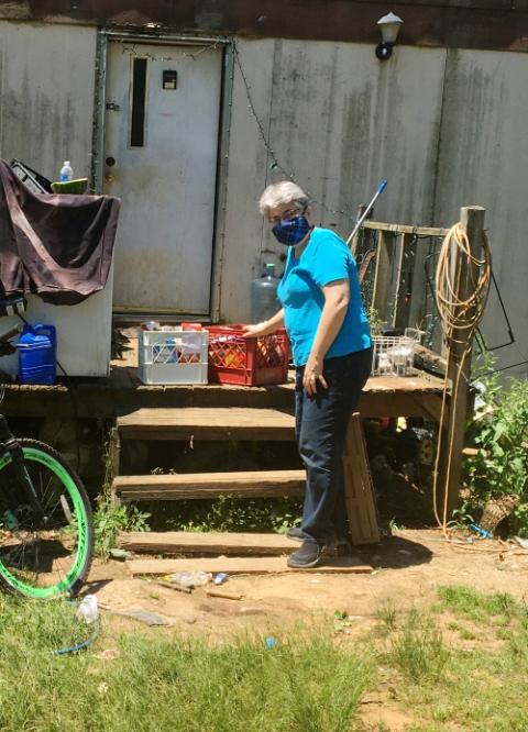 Dubuque Franciscan Sr. Mary Beth Goldsmith delivers food to a home in Mississippi. (Courtesy of Sr. Nancy Schreck)