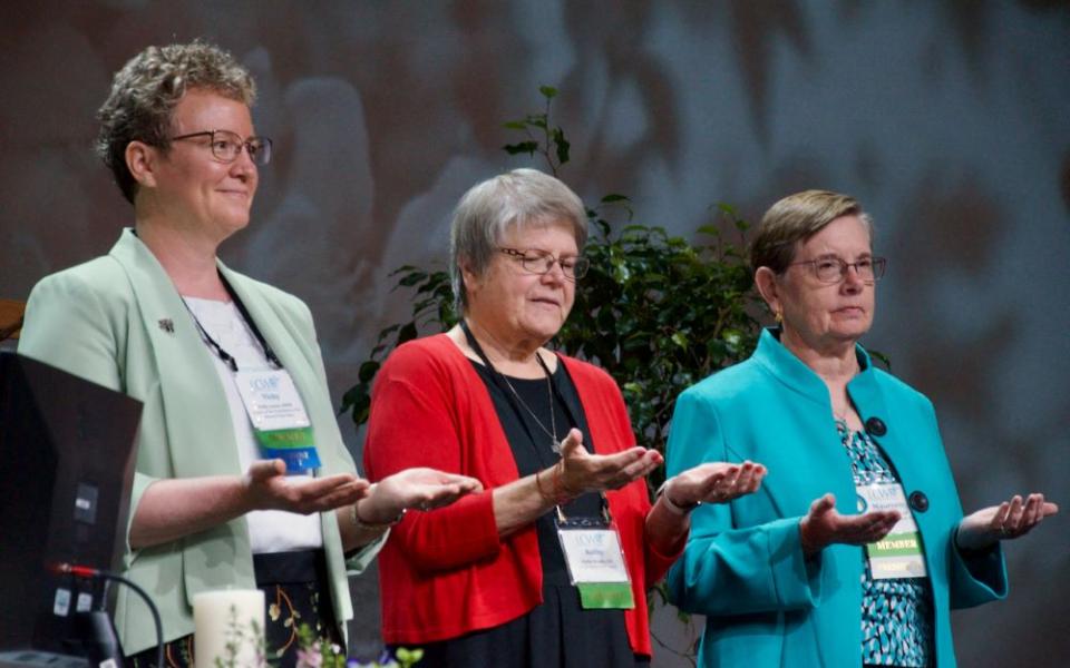 Three women, with Vicky Larson at left 