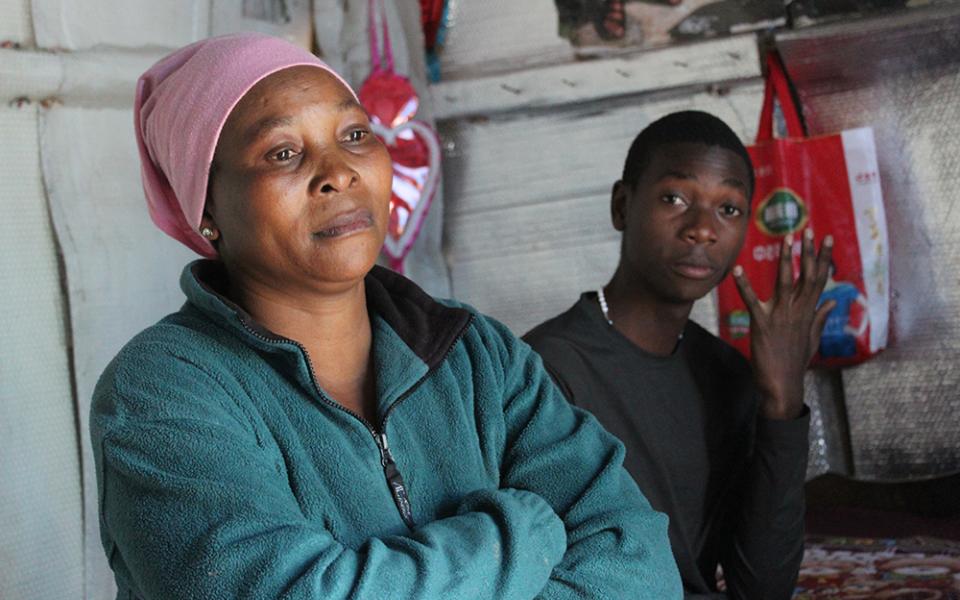 Stanley Joakim, with his mother at their house in Arusha on June 12, 2019. Stanley was kidnapped outside the school gate by unknown people in May 2019. (GSR photo/Doreen Ajiambo)