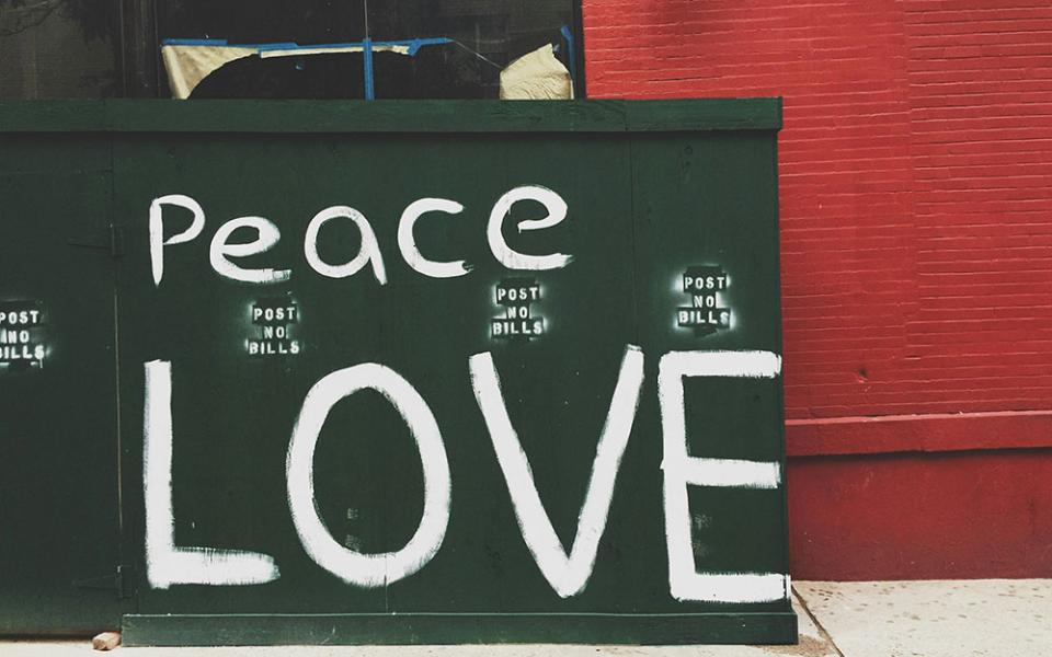 A sign for peace and love (Unsplash/Jon Tyson)