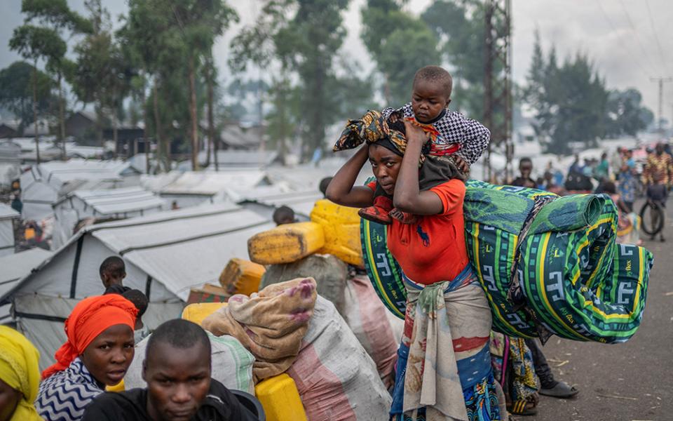 Congolese people displaced by recent clashes between the M23 rebels and the armed forces of the Democratic Republic of the Congo prepare to leave a camp Feb. 12, 2025, and return home after being instructed by the M23 rebels to vacate camps on the outskirts of Goma, Congo. (OSV News/Reuters)