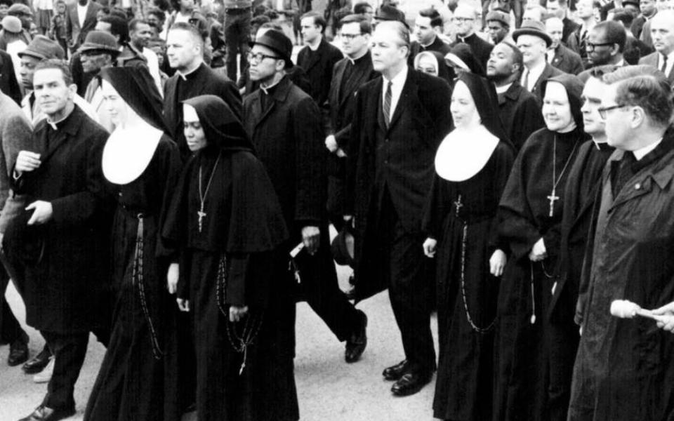 St. Joseph Sr. Rosemary Flanigan, fourth from right, takes part in the 1965 march from Selma to Montgomery, Alabama. (Courtesy of the Center for Practical Bioethics)