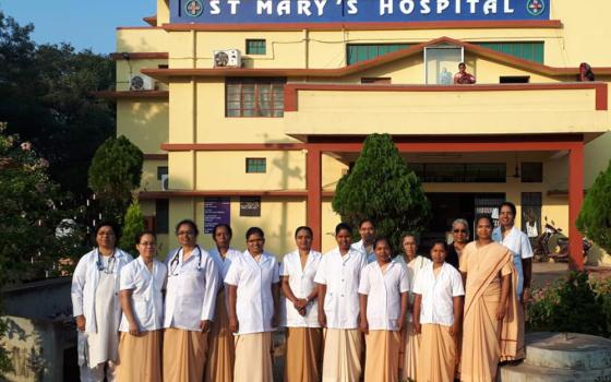 Handmaids of Mary Sisters are pictured outside St. Mary's Hospital in Jharsuguda, Odisha, India. The sisters serve at the hospital, and have continued their work during the pandemic. (Provided photo)