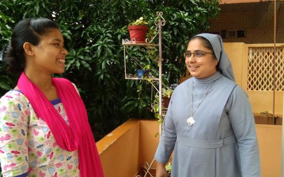 Sr. Anastasia Castellino (right) of Mary Immaculate School, Panaji, Goa, India, with Vandana, a former student (Lissy Maruthanakuzhy)