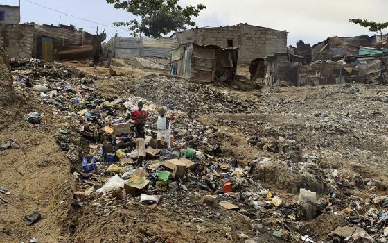 Children are pictured in a file photo in a poor section of Luanda, Angola. (CNS/Alessandro Bianchi, Reuters)