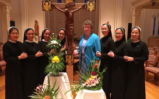 Vietnamese Lovers of the Holy Cross Sisters with Sr. Mary Anne Ownes, the former provincial leader of the School Sisters of Notre Dame on Sept. 14, 2017, in the chapel of the motherhouse in St. Louis, Missouri. (Ngoc Nguyen)