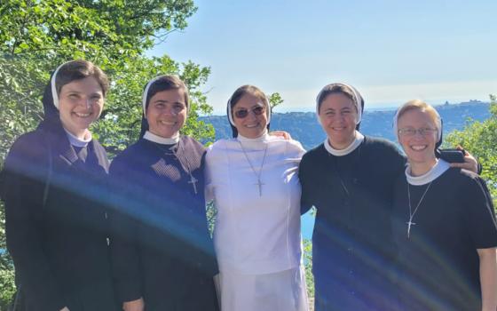 Sr. Kathryn Press, right, poses for a photo with fellow Apostles of the Sacred Heart of Jesus sisters near Lake Albano, Italy. (Courtesy of Apostles of the Sacred Heart of Jesus)