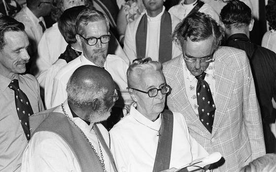 Jeannette Piccard surrounded (left to right) by the Rev. Denzil Carty and her three sons Donald, John and Paul during the processional at the Church of the Advocate, July 29, 1974, in Philadelphia, There she and 10 other women became the first women ordained to the Episcopal priesthood in the U.S. (Brad Hess)
