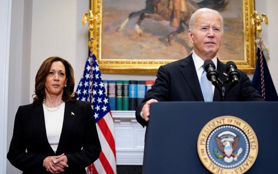 President Joe Biden speaks next to Vice President Kamala Harris as he delivers a statement a day after Republican challenger Donald Trump was shot at a campaign rally, during brief remarks at the White House in Washington, July 14. In an announcement July 21, Biden said he made the historic decision to end his 2024 election bid. (OSV News/Reuters/Nathan Howard)