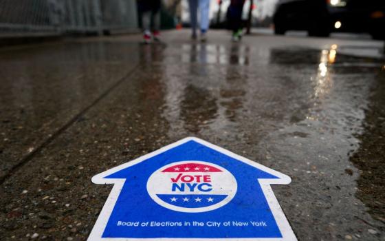 A sign directs people to vote in the New York Presidential Primary election in New York City April 2. (