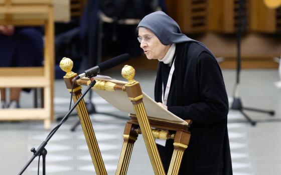 Benedictine Mother Maria Ignazia Angelini, a theologian, speaks during the morning session in the Paul VI Audience Hall at the Vatican Oct. 15. (CNS/Lola Gomez)