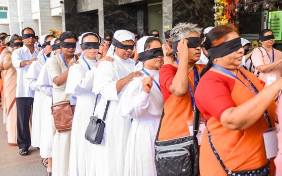 Nuns from the Catholic Health Association of India undertake a blind walk in Bengaluru, India, to spread awareness on eye donation and eye care. (Courtesy of Catholic Health Association of India)