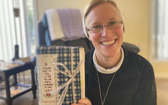 Sr. Kathryn Press displays her Bible from college. 