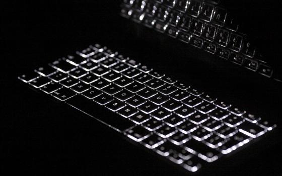 A backlit computer keyboard is seen in this illustration photo. (OSV News/Reuters/Kacper Pempel)