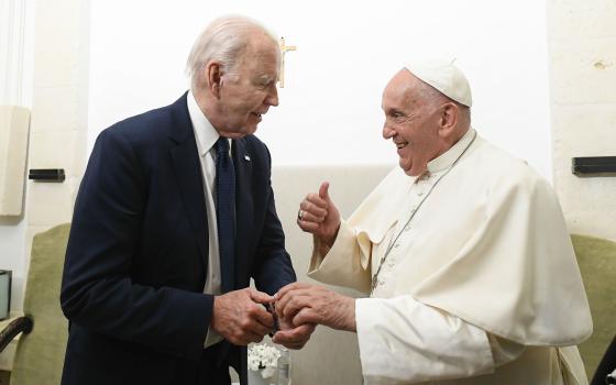 Pope Francis gives U.S. President Joe Biden a thumbs up during a private meeting on the margins of the Group of Seven summit in Borgo Egnazia, in Italy's southern Puglia region, June 14, 2024. (CNS/Vatican Media)