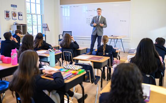 Latin and history teacher Peter Dowdy speaks with a classroom of students at St. Benedict Classical Academy in South Natick, Massachusetts, in this undated photo. (OSV News/Courtesy of Jay Boren)