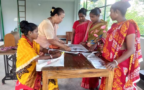 Our Lady of the Missions Sr. Minita Bridgita Chisim teaches tailoring to poor women in the coastal Bagerhat District, in Bangladesh. (Courtesy of Minita Bridgita Chisim)