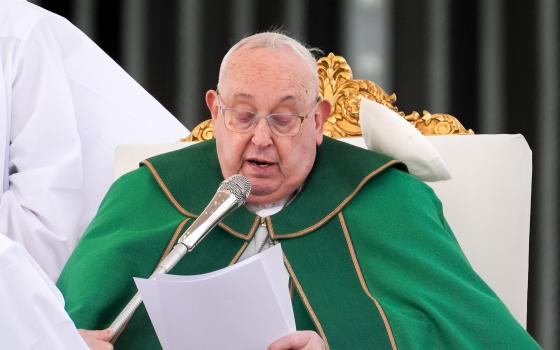 As Pope Francis prays the Angelus at the conclusion of Mass for the Jubilee of the Armed Services, Police and Security Personnel in St. Peter’s Square at the Vatican Feb. 9, 2025, a strong gust of wind blows his zucchetto off his head. (CNS photo/Lola Gomez)