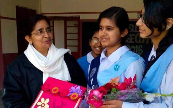 Sr. Nasreen Gian receiving a bouquet from grade 10 students at their farewell party at St Mary's Convent School Multan in 2020. (Courtesy of Sr. Nasreen Gian)