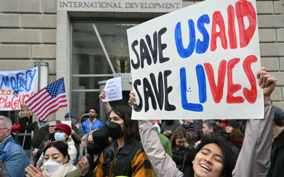 Save USAID Save lives sign