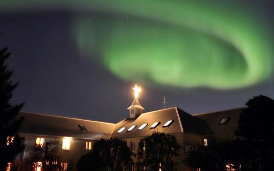 The northern lights appear over the Carmelite monastery located in Hafnarfjördur, Iceland. (Courtesy of Carmelite nuns of Hafnarfjordur)