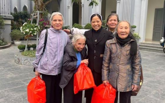 Sr. Nguyen Thi Son and others attend the Lunar New Year 2025 celebration with the Lovers of the Holy Cross sisters at the motherhouse in Hanoi. (Courtesy of LHC sisters)