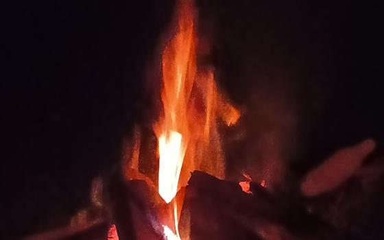 The campfire that burned during a retreat with young people from the village. (Marjorie Guingona)