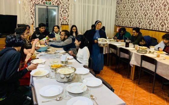 The Sisters of St. Joseph of Saint-Marc at Mukachevo, Ukraine, serve food to rescued foreign students before helping them to cross the border. (Courtesy of Ligi Payyappilly)