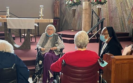 Holy Family Sr. Jean Martinez prays with the rosary group at Chateau de Notre Dame in New Orleans. (Courtesy of Jean Martinez)