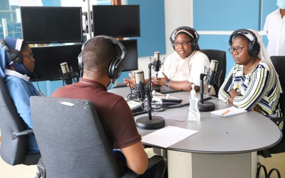 Sisters discuss human trafficking as they broadcast from Radio Maria Yatsani Voice 99.3 FM in Lusaka, Zambia. (Sr. Eucharia Madueke)