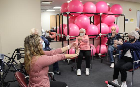 Residents at Benedictine Living Community in Winona, Minnesota, participate in a strengthening exercise class. (Courtesy of Benedictine)