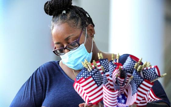 A woman registers to vote at the Amway Center in Orlando, Florida, Sept. 22. (CNS/Orlando Sentinel/Joe Burbank/TNS, ABACAPRESS.COM via Reuters)