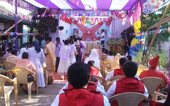 Bishop Sarat Chandra Nayak celebrates Christmas Mass in the Central Jail, in the Berhampur Diocese, in Odisha, India. (Provided photo)