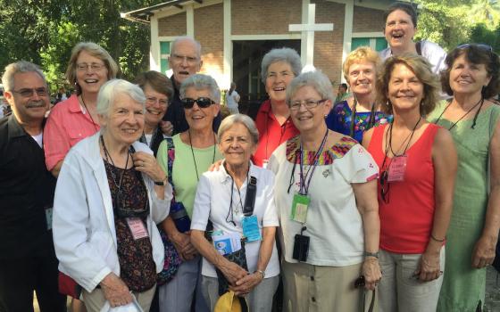 The Boston group poses together in El Salvador on their Share Foundation trip in 2015 for the 35th anniversary of the brutal murder of Maryknoll Srs. Maura Clarke and Ita Ford, Ursuline Sr. Dorothy Kazel and lay missioner Jean Donovan. (Provided photo)