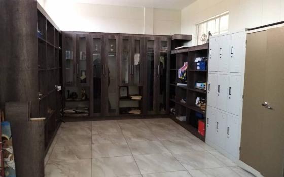 Room with lockers and closets