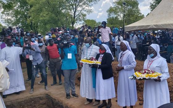 Sisters and members of the Archdiocese of Juba, South Sudan, attend the Aug. 20 burial of Srs. Mary Daniel Abut and Regina Roba, Sisters of the Sacred Heart who were killed when their bus was attacked Aug. 16. (Courtesy of Christy John)