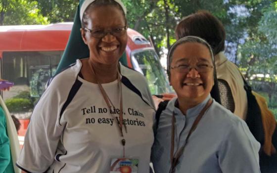 Sr. Letta Mosue, left, superior general of the Sisters of St. Brigid in South Africa, and Sr. Regina Kuizon, province leader of the Religious of the Good Shepherd of Philippines-Japan, are pictured in a 2017 photo in Manila. Mosue died July 19. (GSR)