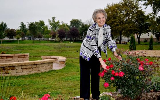 Sr. Donna Liette outside the Precious Blood Ministry of Reconciliation Center in Chicago: "There used to be no trees, no flowers. Now we have lots of flowers. It's a much prettier place." (Dave Eck)